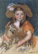 The girl holding the dog